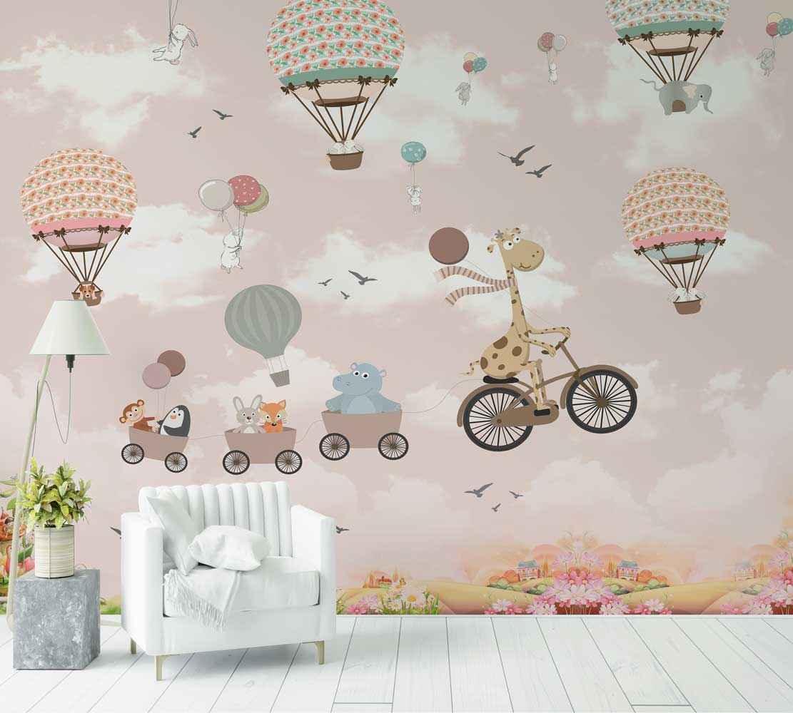 Papier peint chambre enfant, décor girafe à vélo, animaux, montgolfières sur fond rose