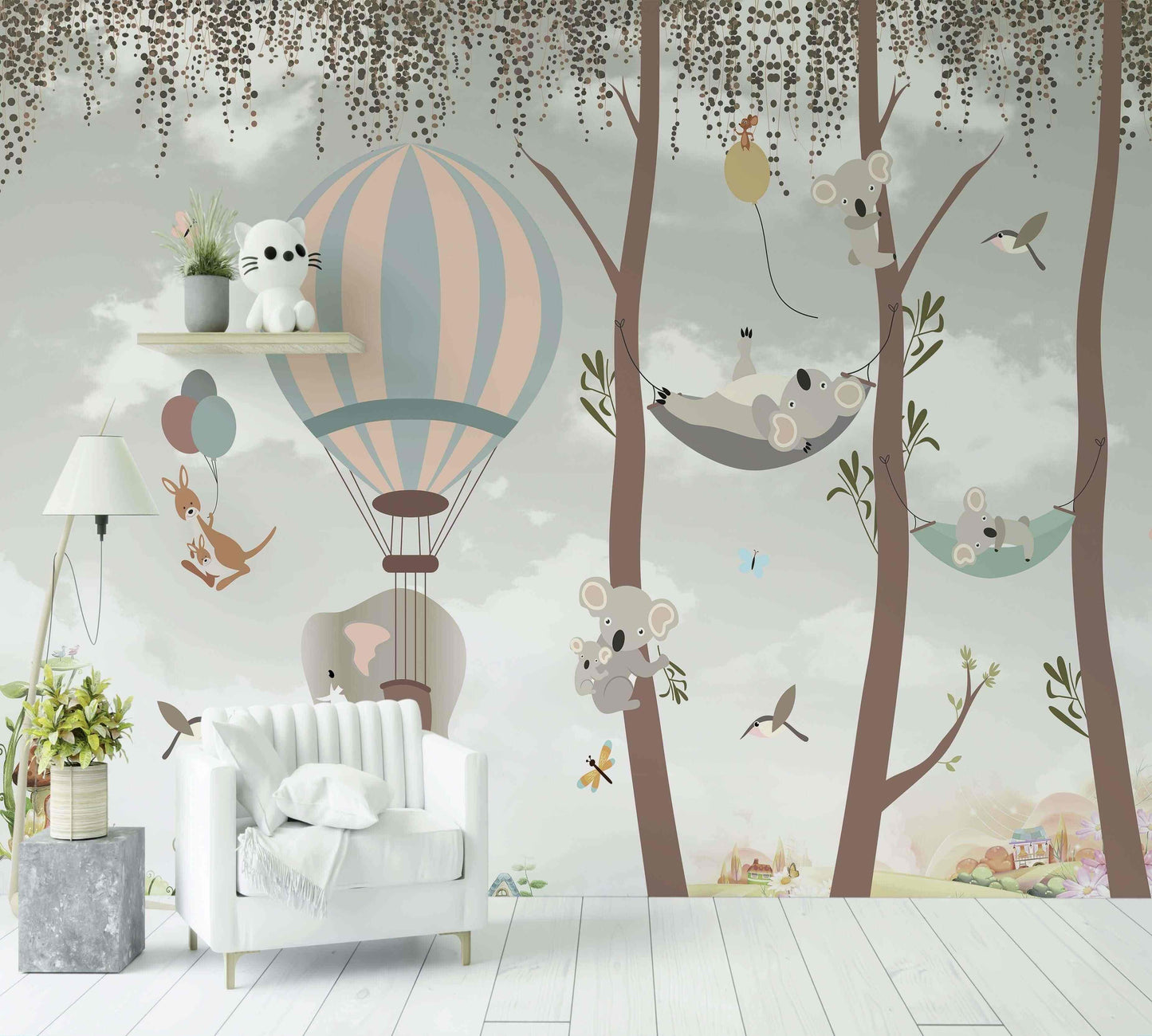 Papier peint enfant avec koalas, montgolfière et arbres dans une chambre décorée
