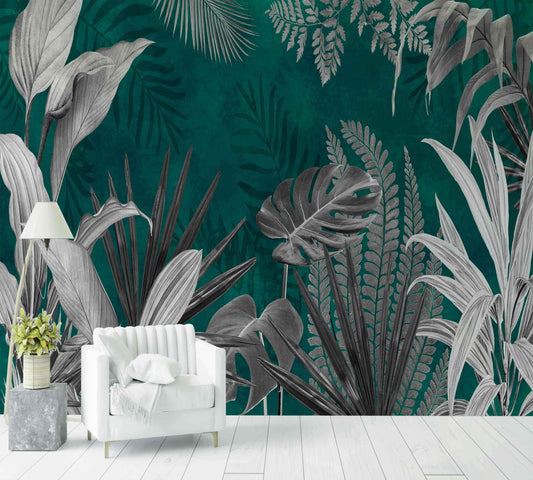 Papier peint botanique vintage avec grandes feuilles grises sur fond vert, canapé blanc moderne